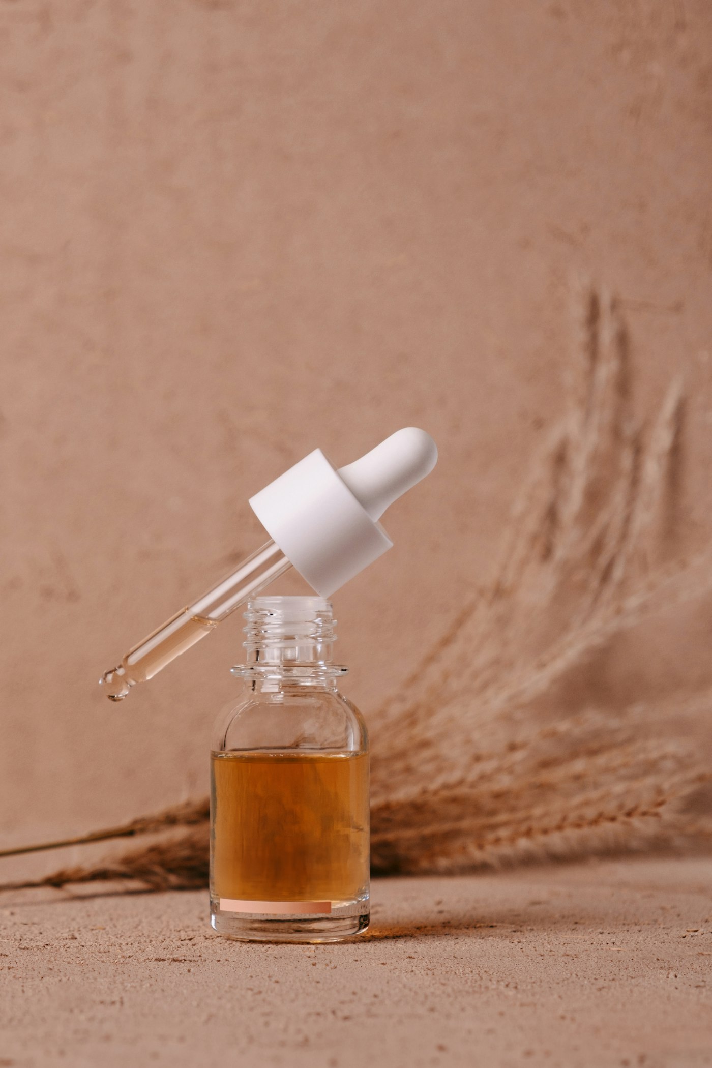 Frasco de óleo facial com conta-gotas
